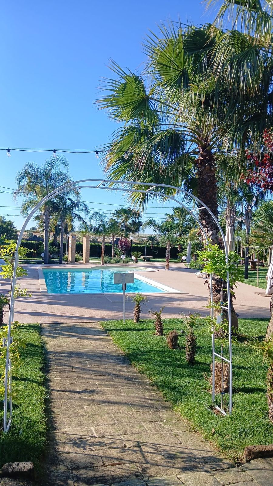 Relais San Giovanni · la piscina fra le palme del giardino, Castellaneta (Taranto)